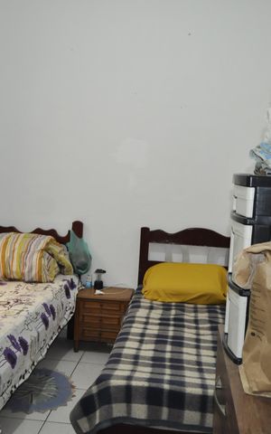 Casa à venda com 75m², 3 quartos e sem vagaQuarto 1