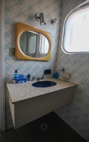 Casa à venda com 390m², 4 quartos e 4 vagasBanheiro da Suíte 2
