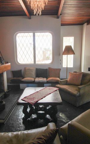 Casa à venda com 390m², 4 quartos e 4 vagasSala