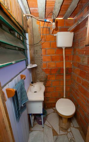 Casa à venda com 80m², 2 quartos e 1 vaga Casa à venda com 80m², 2 quartos e 1 vagaBanheiro de Serviço