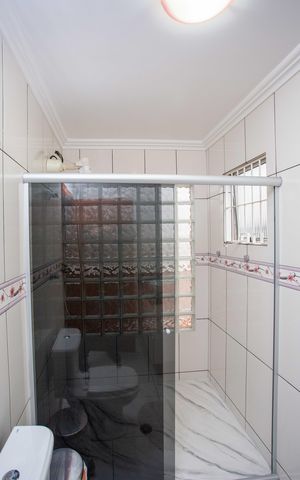 Casa à venda com 215m², 3 quartos e 2 vagasBanheiro da Suíte 1