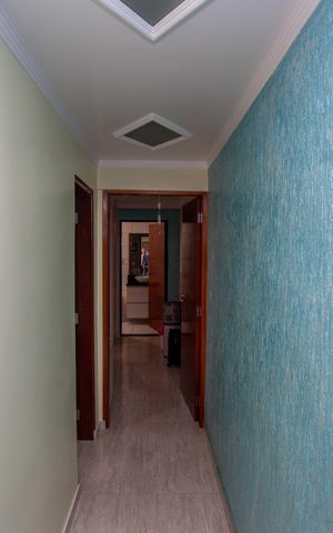 Casa à venda com 215m², 3 quartos e 2 vagasCorredor