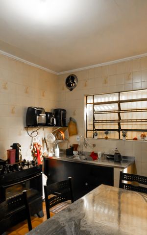 Casa à venda com 400m², 3 quartos e 2 vagas Casa à venda com 400m², 3 quartos e 2 vagasCozinha