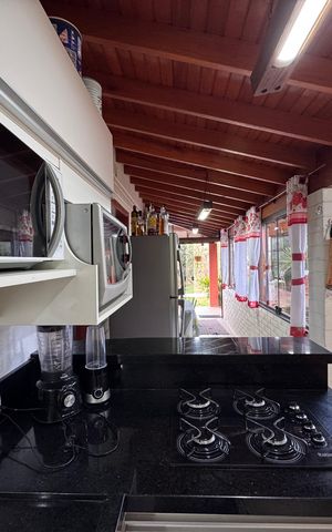 Casa à venda com 150m², 2 quartos e 3 vagas Casa à venda com 150m², 2 quartos e 3 vagasCozinha