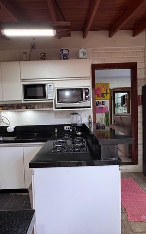 Casa à venda com 150m², 2 quartos e 3 vagas Casa à venda com 150m², 2 quartos e 3 vagasCozinha