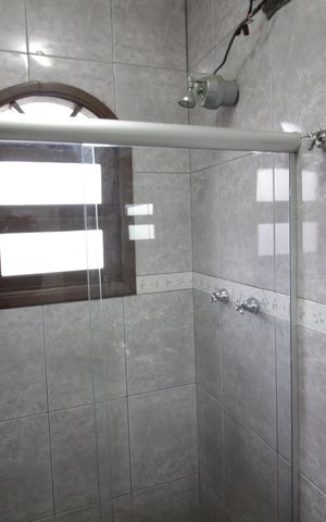 Casa à venda com 121m², 4 quartos e 5 vagasBanheiro da Suíte 2