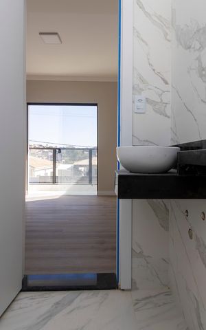 Casa à venda com 130m², 3 quartos e 3 vagas Casa à venda com 130m², 3 quartos e 3 vagasBanheiro da Suíte