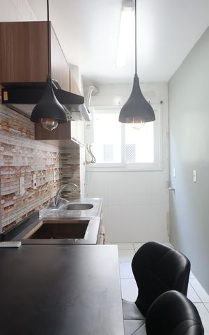 Apartamento à venda com 63m², 2 quartos e 1 vagaCozinha e Área de Serviço