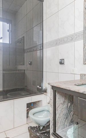 Casa à venda com 410m², 4 quartos e 8 vagasBanheiro da Suíte