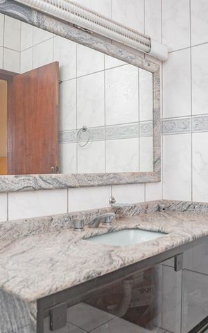 Casa à venda com 410m², 4 quartos e 8 vagasBanheiro da Suíte 3