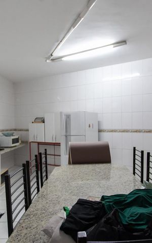 Casa à venda com 402m², 9 quartos e 3 vagas Casa à venda com 402m², 9 quartos e 3 vagasCozinha da Casa 2