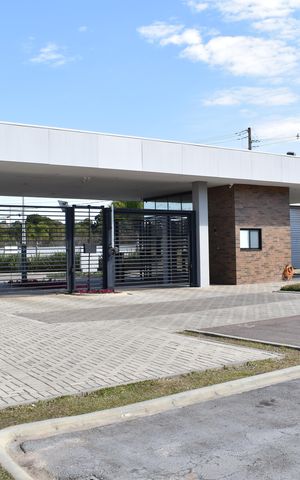 Casa de condomínio para alugar com 171m², 3 quartos e 2 vagasFachada e portaria