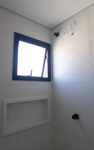 Casa à venda com 125m², 3 quartos e 2 vagasBanheiro da Suíte