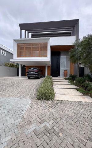 Casa à venda com 850m², 5 quartos e 6 vagas Casa à venda com 850m², 5 quartos e 6 vagasFachada