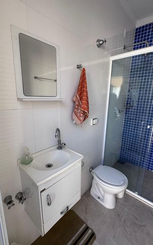 Casa de condomínio à venda com 311m², 4 quartos e 5 vagasBanheiro de Serviço 2