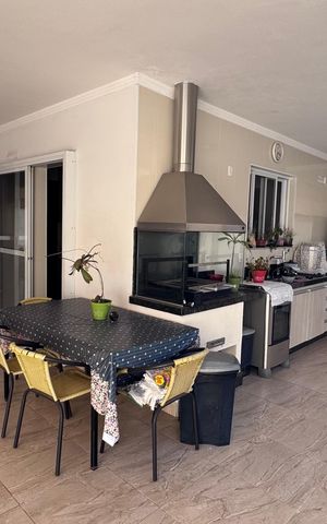 Casa de condomínio à venda com 311m², 4 quartos e 5 vagasÁrea gourmet