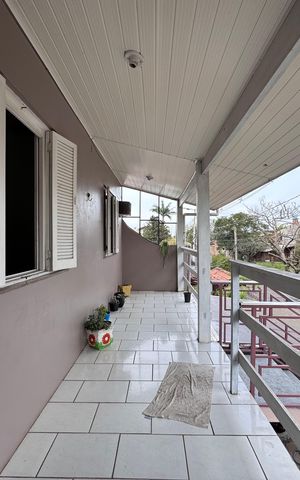 Casa à venda com 210m², 4 quartos e 1 vaga Casa à venda com 210m², 4 quartos e 1 vagaVaranda