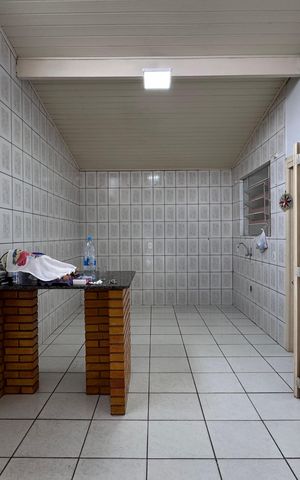 Casa à venda com 210m², 4 quartos e 1 vaga Casa à venda com 210m², 4 quartos e 1 vagaCozinha