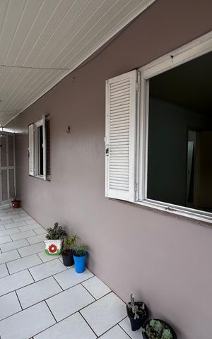 Casa à venda com 210m², 4 quartos e 1 vaga Casa à venda com 210m², 4 quartos e 1 vagaVaranda