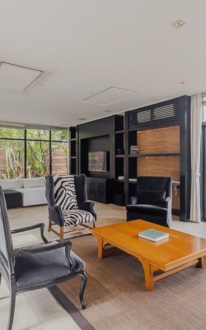 Casa à venda com 700m², 5 quartos e 6 vagasSala de TV