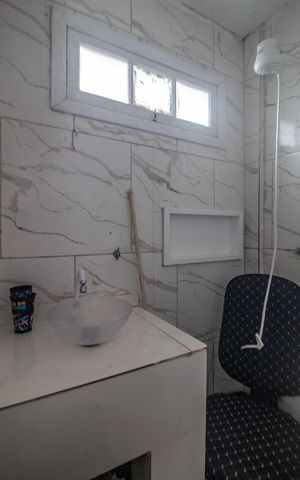 Casa à venda com 300m², 4 quartos e 2 vagas Casa à venda com 300m², 4 quartos e 2 vagasBanheiro da Suíte