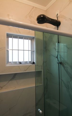 Casa à venda com 100m², 3 quartos e 2 vagasBanheiro Suite 2