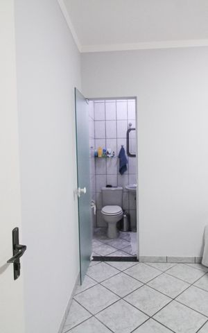 Casa à venda com 100m², 3 quartos e 2 vagasBanheiro Suite 1