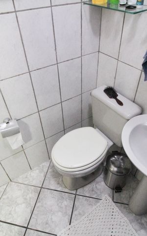 Casa à venda com 100m², 3 quartos e 2 vagasBanheiro Suite 1