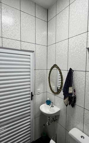 Casa à venda com 308m², 4 quartos e 4 vagasBanheiro de serviço