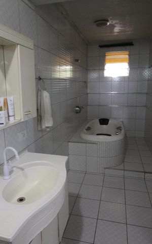 Casa à venda com 132m², 3 quartos e 2 vagasBanheiro da Suíte 