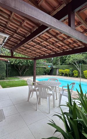 Casa de condomínio à venda com 658m², 3 quartos e 4 vagas Casa de condomínio à venda com 658m², 3 quartos e 4 vagasÁrea externa