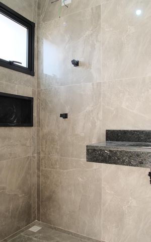 Casa à venda com 140m², 3 quartos e 3 vagasBanheiro da Suíte 1
