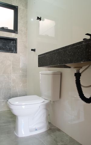 Casa à venda com 140m², 3 quartos e 3 vagasBanheiro da Suíte 3