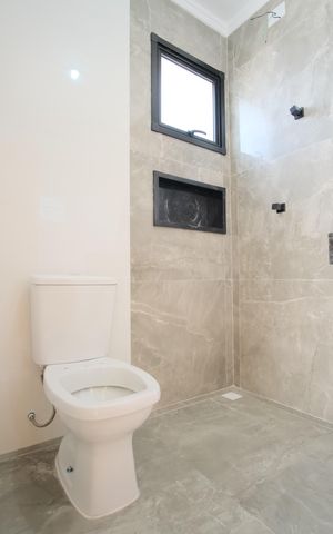 Casa à venda com 140m², 3 quartos e 3 vagasBanheiro da Suíte 1