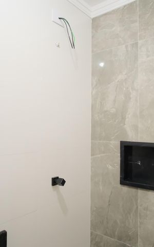 Casa à venda com 140m², 3 quartos e 3 vagasBanheiro da Suíte 2