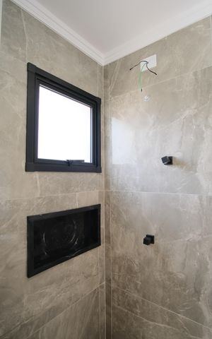 Casa à venda com 140m², 3 quartos e 3 vagasBanheiro da Suíte 1