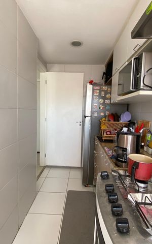 Apartamento à venda com 65m², 2 quartos e 1 vaga Apartamento à venda com 65m², 2 quartos e 1 vagaCozinha e Área de Serviço