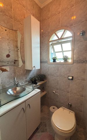 Casa à venda com 198m², 3 quartos e 2 vagas Casa à venda com 198m², 3 quartos e 2 vagasBanheiro da Suíte