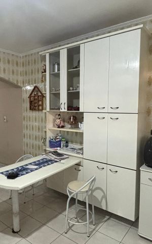 Casa à venda com 198m², 3 quartos e 2 vagas Casa à venda com 198m², 3 quartos e 2 vagasCozinha