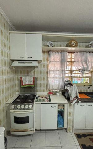Casa à venda com 198m², 3 quartos e 2 vagas Casa à venda com 198m², 3 quartos e 2 vagasCozinha