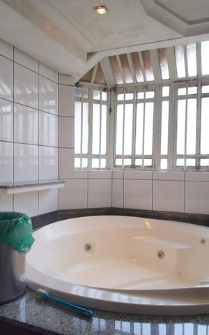 Casa à venda com 244m², 3 quartos e 2 vagasBanheiro da Suíte