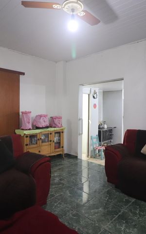 Casa à venda com 600m², 3 quartos e 5 vagasSala casa 01