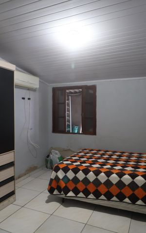 Casa à venda com 100m², 2 quartos e 2 vagasQuarto 1