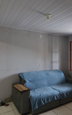 Casa à venda com 100m², 2 quartos e 2 vagasSala de TV