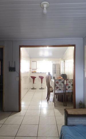 Casa à venda com 100m², 2 quartos e 2 vagasSala de TV