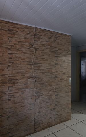 Casa à venda com 100m², 2 quartos e 2 vagasSala de TV