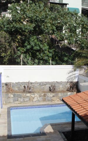 Casa de condomínio à venda com 303m², 5 quartos e 2 vagasVista da Suíte 1