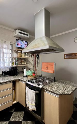 Casa à venda com 200m², 3 quartos e 2 vagas Casa à venda com 200m², 3 quartos e 2 vagasCozinha
