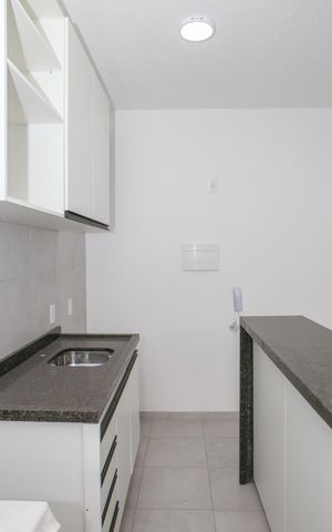 Apartamento à venda com 40m², 1 quarto e sem vaga Apartamento à venda com 40m², 1 quarto e sem vagaCozinha e Área de Serviço