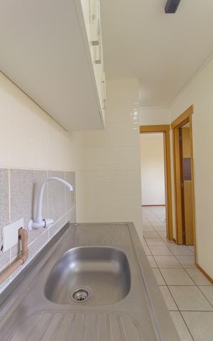 Apartamento à venda com 52m², 2 quartos e 1 vaga Apartamento à venda com 52m², 2 quartos e 1 vagaCozinha e Área de Serviço